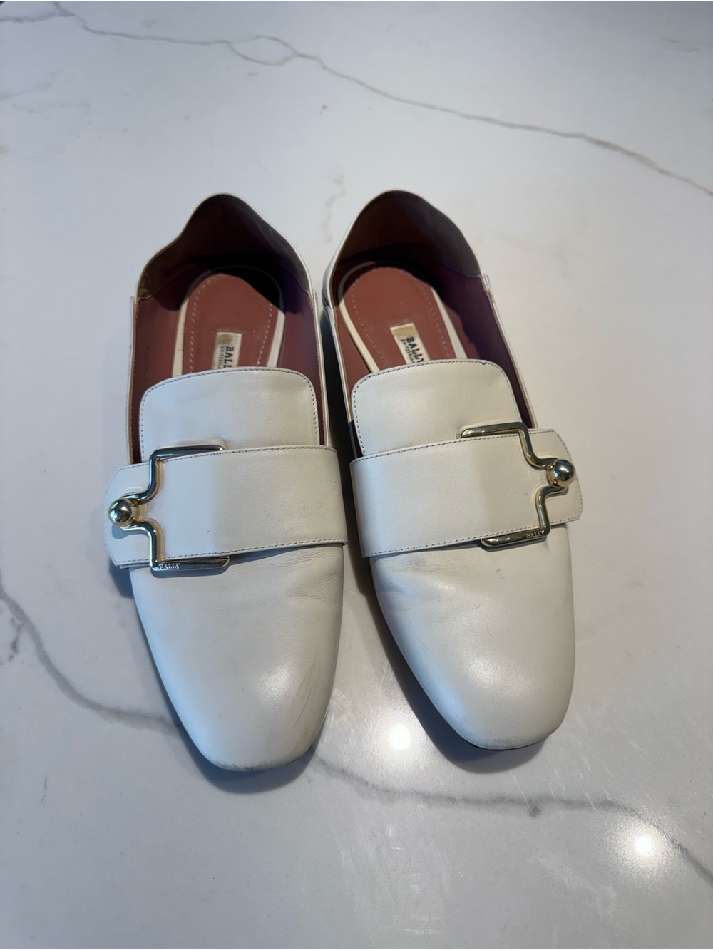 Bally Cream Leather Slip-On Loafers with Gold Hardware